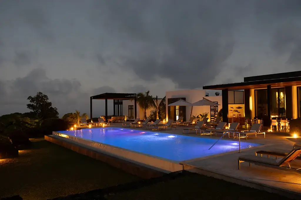 Infinity pool at Pikaia Lodge at dusk