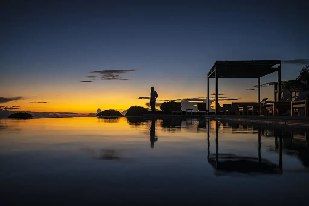 Sunset over the water from Pikaia Lodge