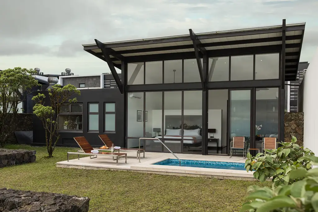 Pikaia Lodge architecture nestled in Galápagos vegetation