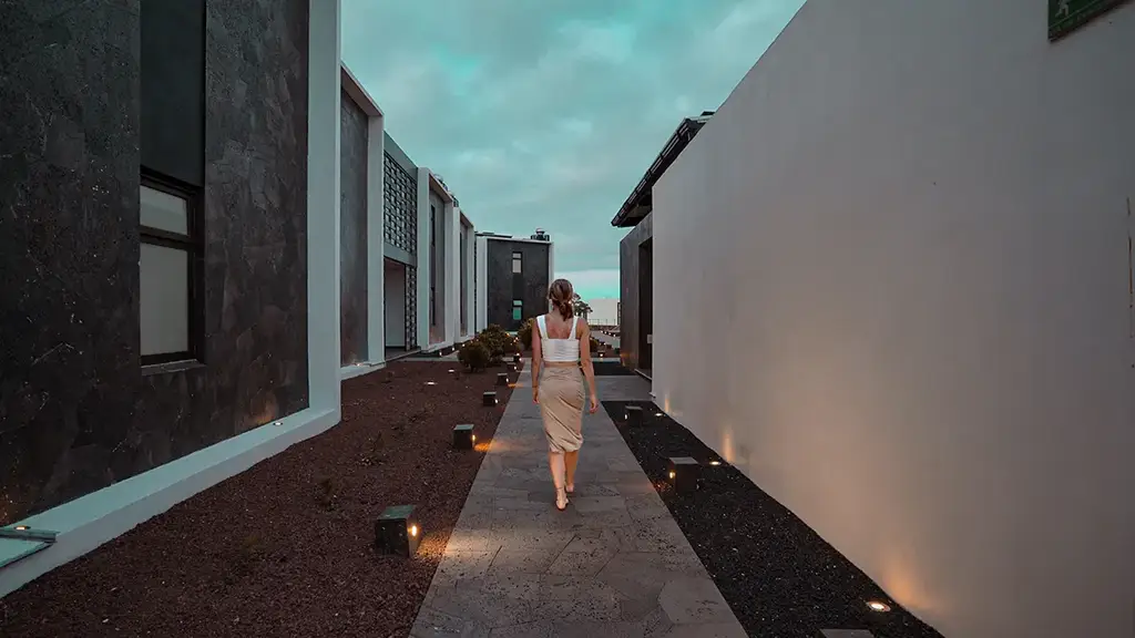 Pathway beside lodge suites at dusk