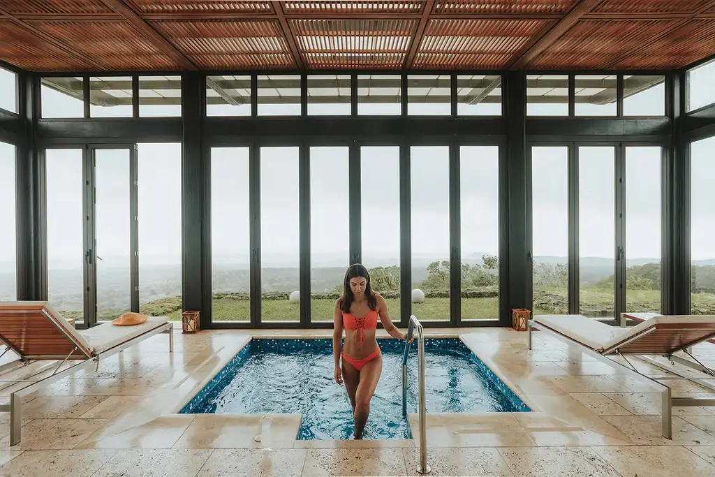 Infinity pool overlooking the Galápagos landscape